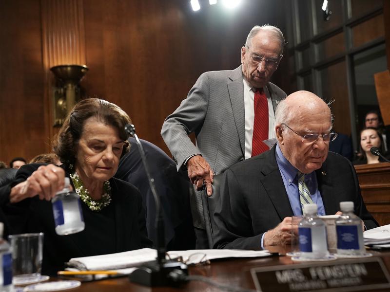 Democratic Sens. Dianne Feinstein and Patrick Leahy (seated) with Judiciary Committee Chairman Chuck Grassley. Democratic Sens. Dianne Feinstein and Patrick Leahy (seated) with Judiciary Committee Chairman Chuck Grassley.