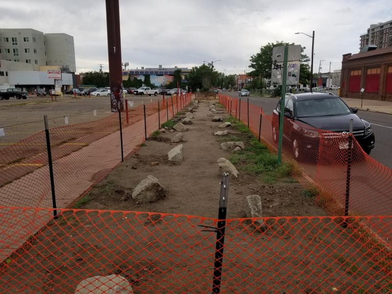 Plastic fencing and landscaping boulders replaced homeless campsites on this block in downtown Denver. Advocates for the homeless fear that displacing encampments risks spreading the coronavirus throughout the homeless community. Plastic fencing and landscaping boulders replaced homeless campsites on this block in downtown Denver. Advocates for the homeless fear that displacing encampments risks spreading the coronavirus throughout the homeless community.
