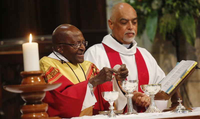Anglican Archbishop Emeritus Desmond Tutu (left) celebrates Mass on his 85th birthday at St. George's Cathedral in Cape Town, South Africa, on Oct. 7. Tutu has called for the right to assisted death, which is currently illegal in his country. Anglican Archbishop Emeritus Desmond Tutu (left) celebrates Mass on his 85th birthday at St. George's Cathedral in Cape Town, South Africa, on Oct. 7. Tutu has called for the right to assisted death, which is currently illegal in his country.