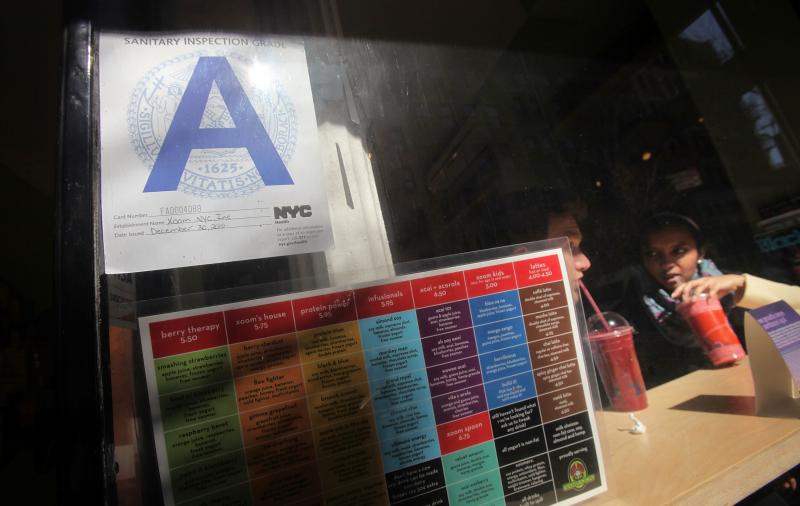 A health inspection grade is posted outside a Manhattan eatery. In several cities, Yelp users can now find out how a restaurant scored on its health inspection well before they walk through the door. A health inspection grade is posted outside a Manhattan eatery. In several cities, Yelp users can now find out how a restaurant scored on its health inspection well before they walk through the door.