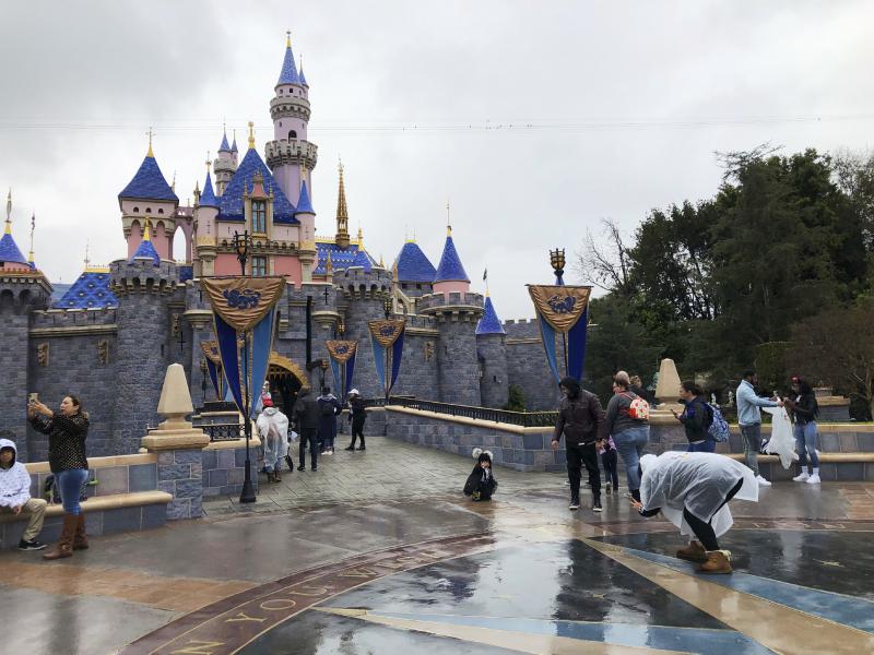 Visitors take photos at Disneyland in Anaheim, Calif., in March 2020. Jungle Cruise, one of the original Disney parks' rides, is getting a 21st century remodel by "imagineers" at the Disneyland park in California and the Magic Kingdom park in Florida with Visitors take photos at Disneyland in Anaheim, Calif., in March 2020. Jungle Cruise, one of the original Disney parks' rides, is getting a 21st century remodel by "imagineers" at the Disneyland park in California and the Magic Kingdom park in Florida with