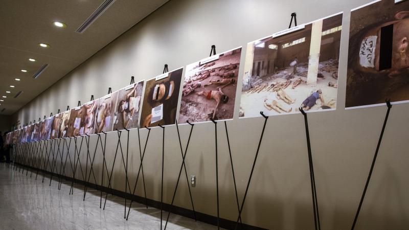 Images of dead bodies in Syrian prisons, taken by a Syrian government photographer, are displayed at the United Nations on March 10. The photographer, who goes by the pseudonym Caesar, took the pictures between 2011, when the Syrian uprising began, and 20 Images of dead bodies in Syrian prisons, taken by a Syrian government photographer, are displayed at the United Nations on March 10. The photographer, who goes by the pseudonym Caesar, took the pictures between 2011, when the Syrian uprising began, and 20