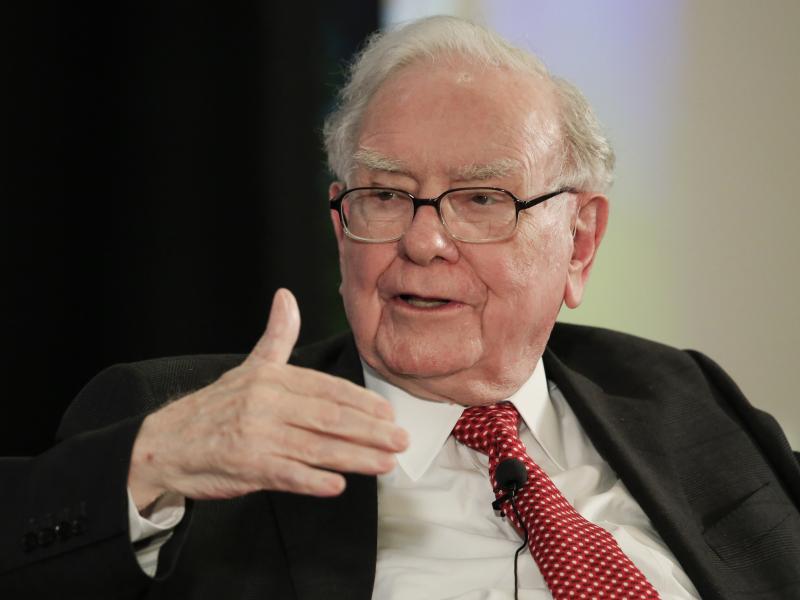 Investor Warren Buffett in 2017 gestures on stage at a national conference sponsored by the Purpose Built Communities group that Buffett supports in Omaha, Neb. Buffet says any Berkshire Hathaway employee who correctly predicts all Sweet 16 teams in the m Investor Warren Buffett in 2017 gestures on stage at a national conference sponsored by the Purpose Built Communities group that Buffett supports in Omaha, Neb. Buffet says any Berkshire Hathaway employee who correctly predicts all Sweet 16 teams in the m