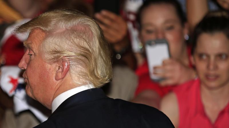 Presumptive Republican nominee Donald Trump meets with supporters after a campaign event Thursday at Gilley's in Dallas. Presumptive Republican nominee Donald Trump meets with supporters after a campaign event Thursday at Gilley's in Dallas.