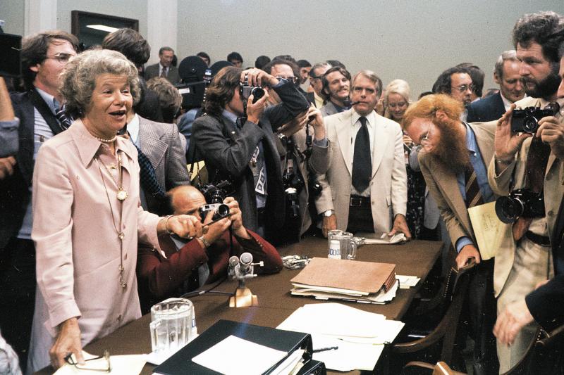 Columnist Mary McGrory holds court among reporters and observers at the 1973 Watergate hearings. Columnist Mary McGrory holds court among reporters and observers at the 1973 Watergate hearings.