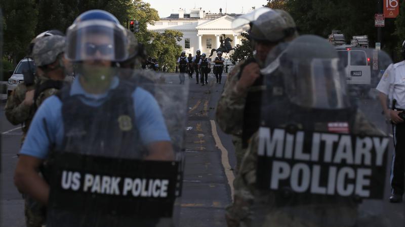 Authorities clear Lafayette Park in Washington, D.C., on Monday, while across the street at the White House, President Trump said he would send the military to U.S. cities if local officials don't end unrest. Authorities clear Lafayette Park in Washington, D.C., on Monday, while across the street at the White House, President Trump said he would send the military to U.S. cities if local officials don't end unrest.