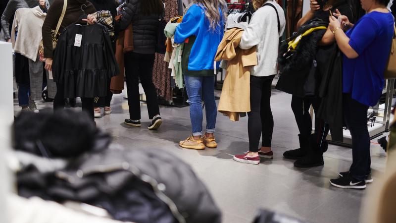 Customers stand in line at a Zara store on Black Friday in Paramus, N.J., on Friday. Customers stand in line at a Zara store on Black Friday in Paramus, N.J., on Friday.