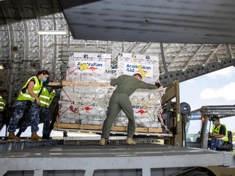 In this photo provided by the Australian Defence Force, personnel unload emergency aid supplies at Tonga's Fuaʻamotu International Airport, near Nukuʻalofa, Thursday, Jan. 20, 2022, after a volcano eruption. In this photo provided by the Australian Defence Force, personnel unload emergency aid supplies at Tonga's Fuaʻamotu International Airport, near Nukuʻalofa, Thursday, Jan. 20, 2022, after a volcano eruption.
