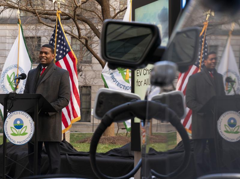 Environmental Protection Agency Administrator Michael Regan is reflected in an electronic vehicle as it charges as he speaks during an event to announce a final rule for federal greenhouse gas emissions standards for cars and trucks on Monday. Environmental Protection Agency Administrator Michael Regan is reflected in an electronic vehicle as it charges as he speaks during an event to announce a final rule for federal greenhouse gas emissions standards for cars and trucks on Monday.