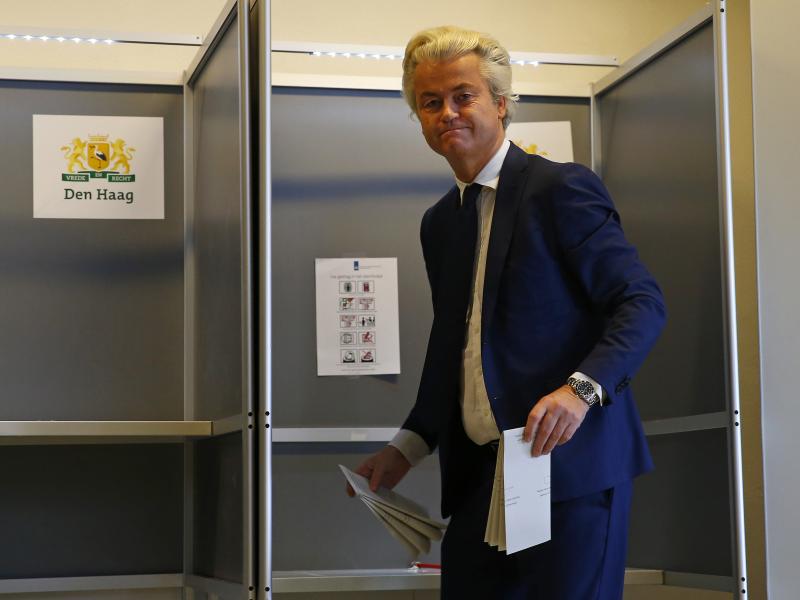 Firebrand ethno-nationalist lawmaker Geert Wilders prepares to cast his vote in the Dutch general election Wednesday in The Hague, Netherlands. Exit Polls suggested a poor showing for his party. Firebrand ethno-nationalist lawmaker Geert Wilders prepares to cast his vote in the Dutch general election Wednesday in The Hague, Netherlands. Exit Polls suggested a poor showing for his party.