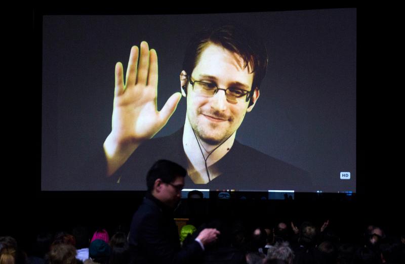 Former U.S. National Security Agency contractor Edward Snowden appears live via video during a student organized world affairs conference at the Upper Canada College private high school in Toronto in February. Former U.S. National Security Agency contractor Edward Snowden appears live via video during a student organized world affairs conference at the Upper Canada College private high school in Toronto in February.
