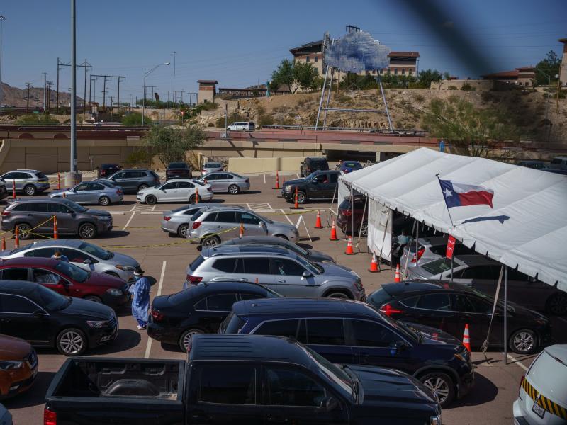 Cars line up for coronavirus tests at the University of Texas at El Paso on Oct. 23. The city has seen a surge in cases, prompting a judge to issue a shutdown of nonessential businesses. Cars line up for coronavirus tests at the University of Texas at El Paso on Oct. 23. The city has seen a surge in cases, prompting a judge to issue a shutdown of nonessential businesses.
