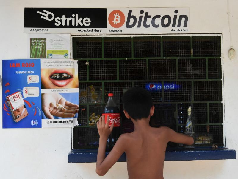 A sign at a store in El Zonte, El Salvador, advertises that it accepts bitcoins for payment. A sign at a store in El Zonte, El Salvador, advertises that it accepts bitcoins for payment.