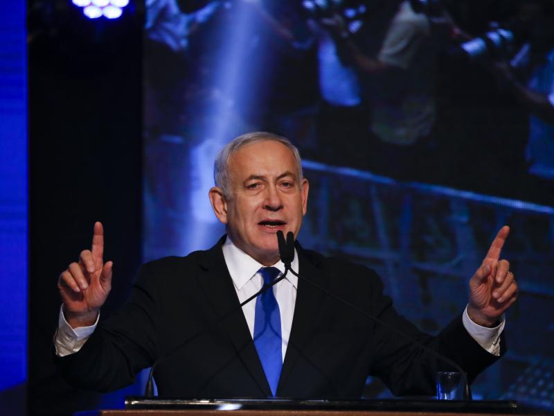 Israeli Prime Minister Benjamin Netanyahu addresses his supporters at party headquarters after elections in Tel Aviv, Israel, on Wednesday. Israeli Prime Minister Benjamin Netanyahu addresses his supporters at party headquarters after elections in Tel Aviv, Israel, on Wednesday.