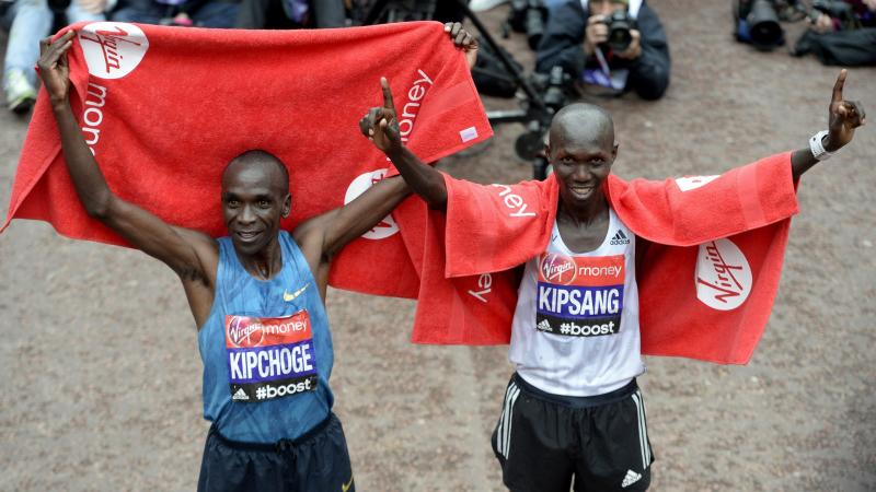 Kenya's Eliud Kipchoge (left) celebrates winning the London Marathon next to runner-up and last year's winner Wilson Kipsang, also of Kenya, on Sunday. Kenya's Eliud Kipchoge (left) celebrates winning the London Marathon next to runner-up and last year's winner Wilson Kipsang, also of Kenya, on Sunday.