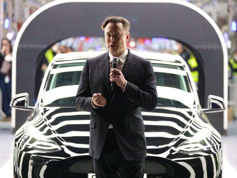 Tesla CEO Elon Musk speaks during the official opening of the new Tesla electric car manufacturing plant near Gruenheide, Germany, on March 22. Musk reportedly wants to lay off 10% of staff because of his worries about the economy. Tesla CEO Elon Musk speaks during the official opening of the new Tesla electric car manufacturing plant near Gruenheide, Germany, on March 22. Musk reportedly wants to lay off 10% of staff because of his worries about the economy.