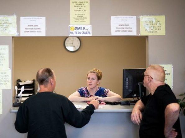 Clarisa Corber at work at a Topeka, Kan., insurance agency. Corber and her husband — who have three kids, a health plan and $15,000 in medical debt — were profiled in a recent Los Angeles Times investigation into the effects of high-deductible health Clarisa Corber at work at a Topeka, Kan., insurance agency. Corber and her husband — who have three kids, a health plan and $15,000 in medical debt — were profiled in a recent Los Angeles Times investigation into the effects of high-deductible health
