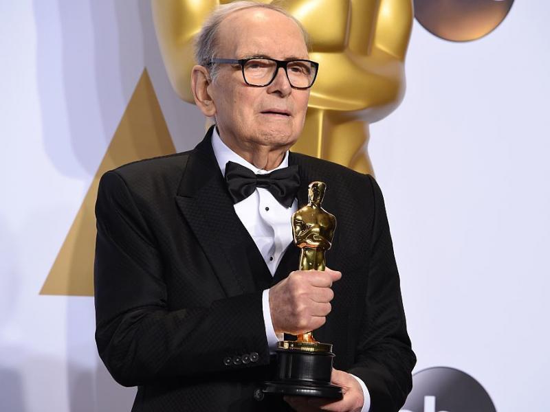 Composer Ennio Morricone, posing with his Oscar for The Hateful Eight in 2016. He died Monday at age 91 in Rome. Composer Ennio Morricone, posing with his Oscar for The Hateful Eight in 2016. He died Monday at age 91 in Rome.