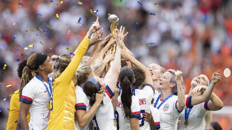 U.S. Women's National Team players celebrate with the FIFA Women's World Cup Trophy following team's victory Sunday. U.S. Women's National Team players celebrate with the FIFA Women's World Cup Trophy following team's victory Sunday.