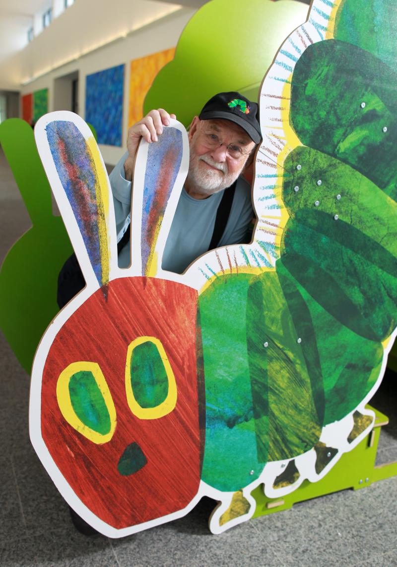 Eric Carle with a cutout of his famously hungry caterpillar at the Eric Carle Museum of Picture Book Art in Amherst, Mass. Eric Carle with a cutout of his famously hungry caterpillar at the Eric Carle Museum of Picture Book Art in Amherst, Mass.