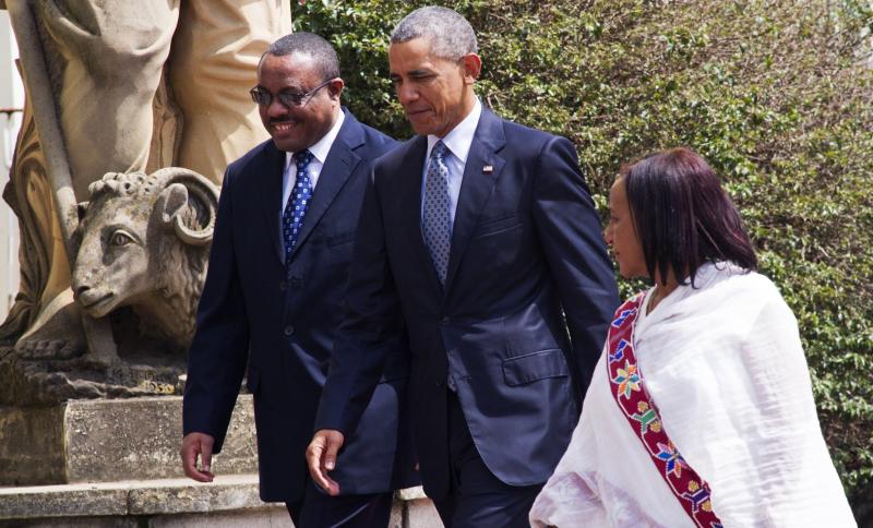 Ethiopian Prime Minister Hailemariam Desalegn (left), walks alongside President Obama during the U.S. president's visit to the African nation last July. Critics say Ethiopia has cracked down hard on the opposition, but makes modest gestures to give the im Ethiopian Prime Minister Hailemariam Desalegn (left), walks alongside President Obama during the U.S. president's visit to the African nation last July. Critics say Ethiopia has cracked down hard on the opposition, but makes modest gestures to give the im