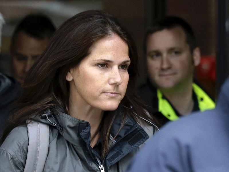 Former University of Southern California soccer coach Laura Janke exiting a Boston federal court Tuesday, where she pleaded guilty to charges in a nationwide college admissions bribery scandal. Former University of Southern California soccer coach Laura Janke exiting a Boston federal court Tuesday, where she pleaded guilty to charges in a nationwide college admissions bribery scandal.