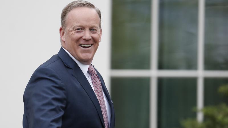 Outgoing White House press secretary Sean Spicer smiles as he departs the White House on July 21. Earlier that day Spicer resigned his position. Outgoing White House press secretary Sean Spicer smiles as he departs the White House on July 21. Earlier that day Spicer resigned his position.