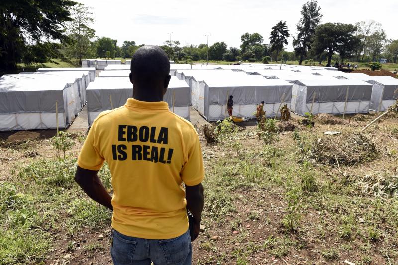 A man stands above a new Ebola treatment center in Monrovia, Liberia. Health workers in Liberia, the hardest-hit nation, have turned people away from treatment units because of shortages of beds and staff. A man stands above a new Ebola treatment center in Monrovia, Liberia. Health workers in Liberia, the hardest-hit nation, have turned people away from treatment units because of shortages of beds and staff.