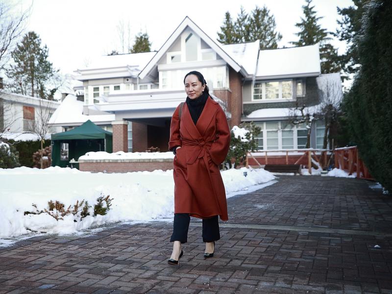Huawei Chief Financial Officer Meng Wanzhou leaves her house on her way to a court appearance on Friday in Vancouver, Canada. The U.S. government has accused Meng of fraud. Huawei Chief Financial Officer Meng Wanzhou leaves her house on her way to a court appearance on Friday in Vancouver, Canada. The U.S. government has accused Meng of fraud.