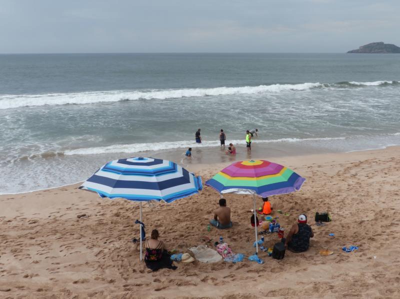 Beachgoers enjoy the shore in Mazatlan, Sinaloa state, Mexico on Sunday. Hurricane Willa, now a Category 5, is expected to land in the region late Tuesday or Wednesday. Beachgoers enjoy the shore in Mazatlan, Sinaloa state, Mexico on Sunday. Hurricane Willa, now a Category 5, is expected to land in the region late Tuesday or Wednesday.