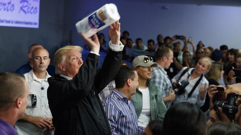 President Trump tosses paper towels into a crowd in Puerto Rico after Hurricane Maria hit the island in 2017. President Trump tosses paper towels into a crowd in Puerto Rico after Hurricane Maria hit the island in 2017.