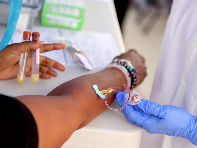 A medical worker draws blood at a free coronavirus antibody testing event in Los Angeles on Wednesday. A medical worker draws blood at a free coronavirus antibody testing event in Los Angeles on Wednesday.