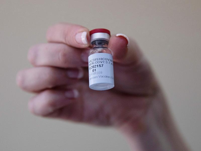 A health care worker holds a vial of the Johnson & Johnson COVID-19 vaccine at Klerksdorp Hospital in Klerksdorp, South Africa, on Feb. 18. A health care worker holds a vial of the Johnson & Johnson COVID-19 vaccine at Klerksdorp Hospital in Klerksdorp, South Africa, on Feb. 18.