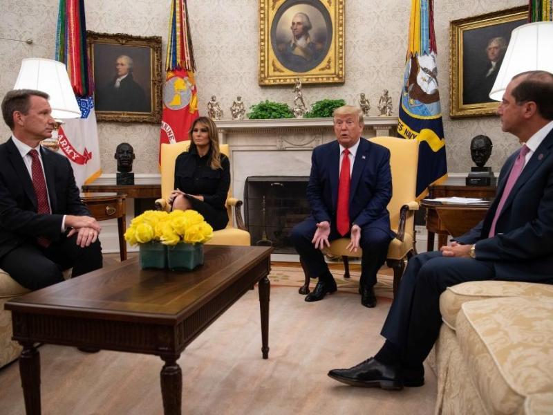 President Trump speaks to the press with first lady Melania Trump and Acting Food and Drug Administration Commissioner Norman Sharpless (left) and Health and Human Services Secretary Alex Azar in the Oval Office at the White House on Wednesday. President Trump speaks to the press with first lady Melania Trump and Acting Food and Drug Administration Commissioner Norman Sharpless (left) and Health and Human Services Secretary Alex Azar in the Oval Office at the White House on Wednesday.