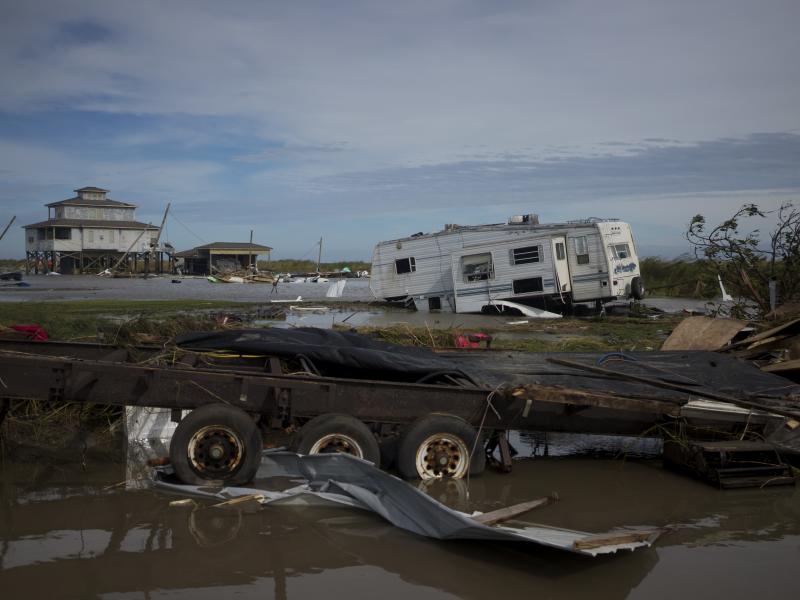 A trailer is left damaged and debris scattered Thursday in Holly Beach, La., in the aftermath of Hurricane Laura. A trailer is left damaged and debris scattered Thursday in Holly Beach, La., in the aftermath of Hurricane Laura.