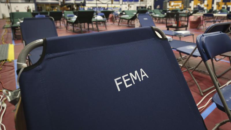 A portable FEMA cot at a temporary medical facility in a gym at Southern New Hampshire University. A portable FEMA cot at a temporary medical facility in a gym at Southern New Hampshire University.