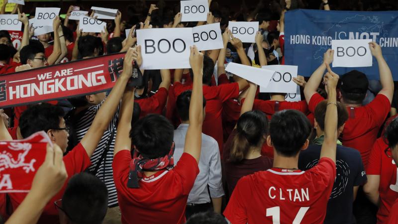 Hong Kong soccer fans protest the Chinese national anthem during a 2022 World Cup qualification game in Hong Kong, Sept. 10, 2019. Hong Kong soccer fans protest the Chinese national anthem during a 2022 World Cup qualification game in Hong Kong, Sept. 10, 2019.