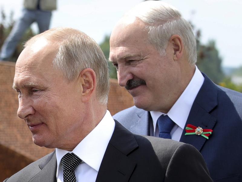 Russian President Vladimir Putin and Belarusian President Alexander Lukashenko greet a group of World War II veterans in the Russian village of Khoroshevo on June 30. Russian President Vladimir Putin and Belarusian President Alexander Lukashenko greet a group of World War II veterans in the Russian village of Khoroshevo on June 30.