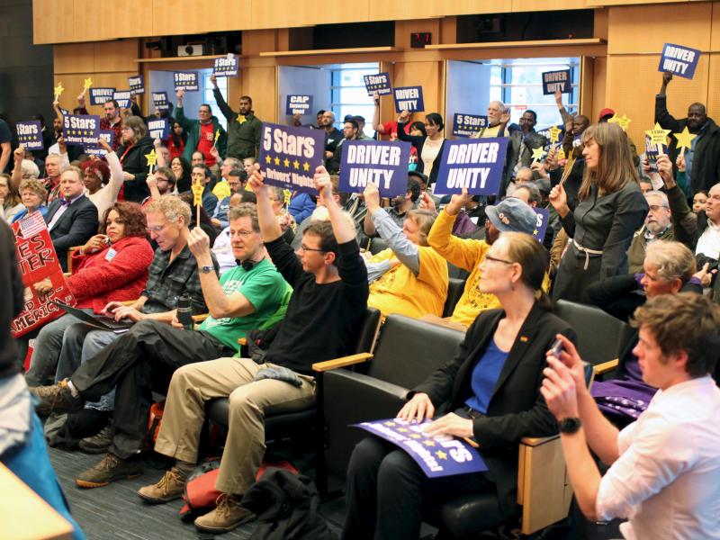Supporters cheer during a meeting Monday when the Seattle City Council voted to approve a measure that would allow ride sharing drivers for Uber and other ride services to unionize. Supporters cheer during a meeting Monday when the Seattle City Council voted to approve a measure that would allow ride sharing drivers for Uber and other ride services to unionize.