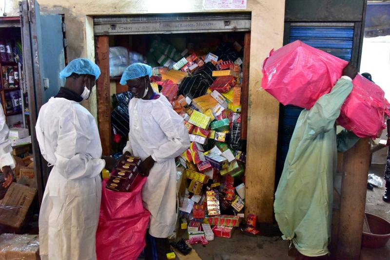 Employees from Ivory Coast's health ministry raid a shop selling counterfeit drugs at the Adjame market in Abidjan earlier this year. Employees from Ivory Coast's health ministry raid a shop selling counterfeit drugs at the Adjame market in Abidjan earlier this year.