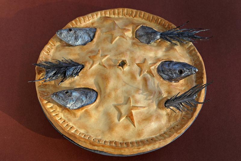 Stargazy Pie, a Cornish dish named for the way the fish heads poke through the crust toward the sky. Stargazy Pie, a Cornish dish named for the way the fish heads poke through the crust toward the sky.