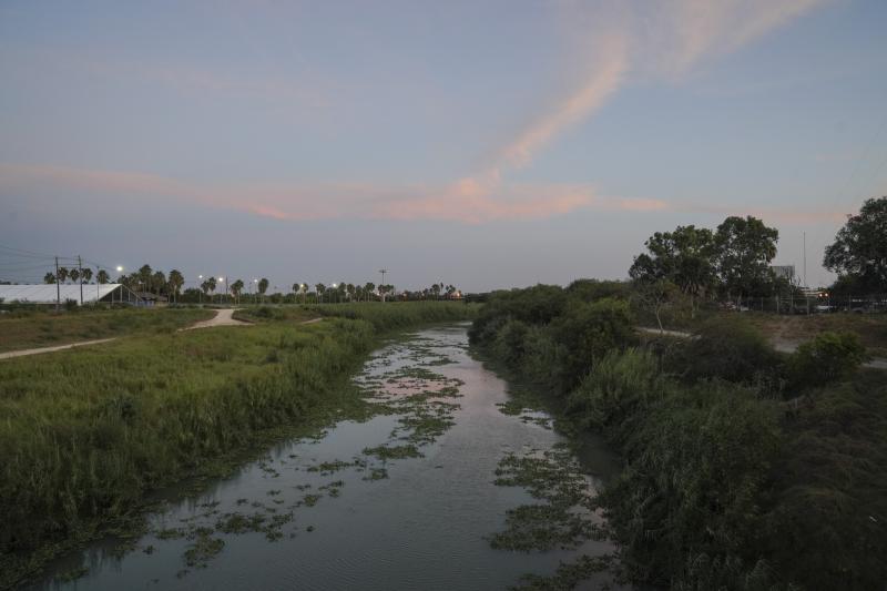 The Rio Grande as seen from the Gateway International Bridge in Matamoros, Mexico, in 2019. A mother and her four daughters from Honduras crossed the river nearly three years ago to seek asylum. The daughters were released from a federally funded shelter The Rio Grande as seen from the Gateway International Bridge in Matamoros, Mexico, in 2019. A mother and her four daughters from Honduras crossed the river nearly three years ago to seek asylum. The daughters were released from a federally funded shelter