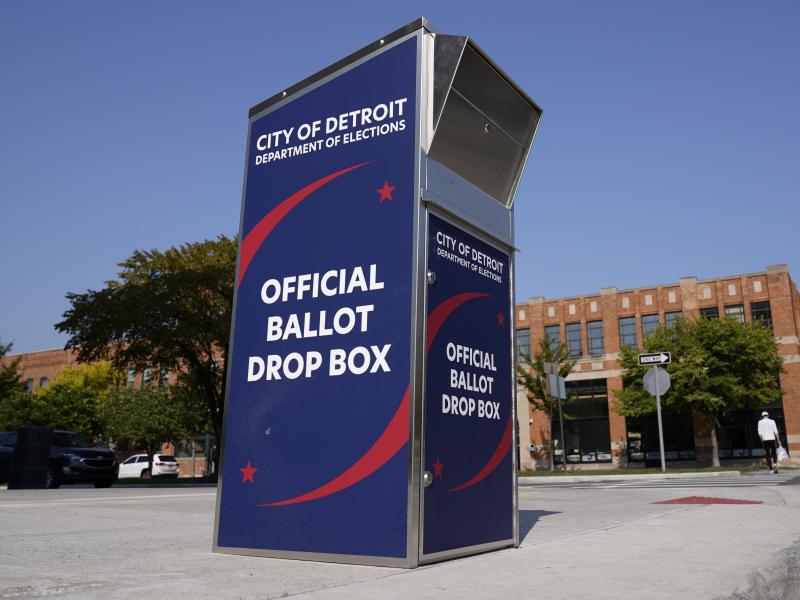 Voters can drop off absentee ballots at a ballot drop box in Detroit instead of using the mail. Voters can drop off absentee ballots at a ballot drop box in Detroit instead of using the mail.
