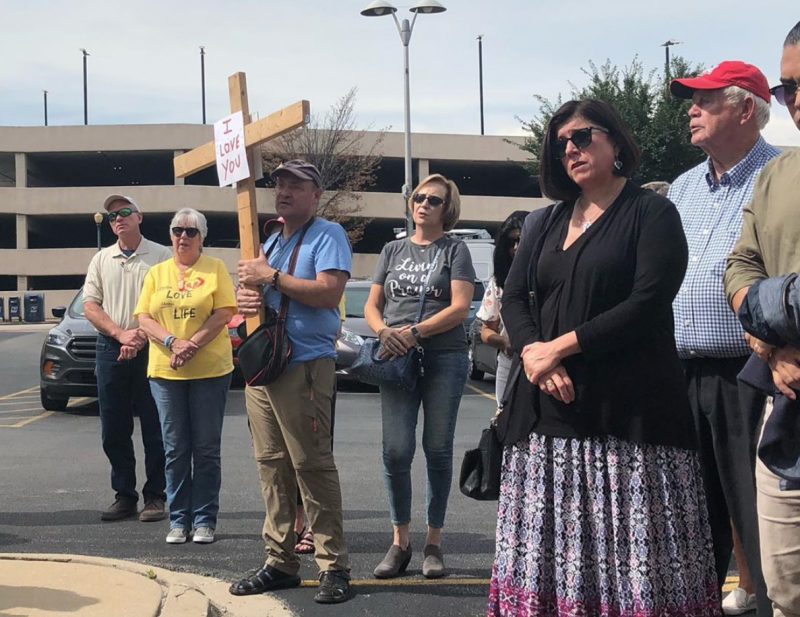 A few dozen anti-abortion activists gathered outside the coroner's office in Will County, Ill., on Thursday, to pray and call for formal burial of the remains. A few dozen anti-abortion activists gathered outside the coroner's office in Will County, Ill., on Thursday, to pray and call for formal burial of the remains.
