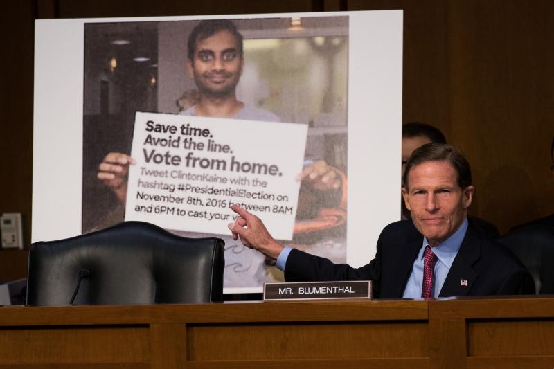 With a Twitter post — including a doctored photo that made it appear as if actor Aziz Ansari was encouraging voters to vote from home — displayed behind him, Sen. Richard Blumenthal, D-Conn. questions witnesses during an October 2017 Senate hearing on With a Twitter post — including a doctored photo that made it appear as if actor Aziz Ansari was encouraging voters to vote from home — displayed behind him, Sen. Richard Blumenthal, D-Conn. questions witnesses during an October 2017 Senate hearing on