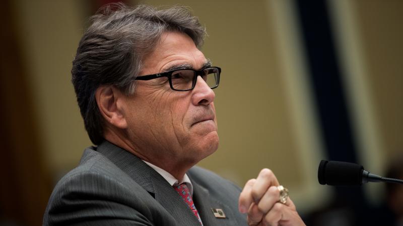 Secretary of Energy Rick Perry testifies during a House Energy and Commerce Committee hearing on Capitol Hill in Washington, D.C., on Oct. 12. Perry's proposed rule to benefit nuclear and coal power plants has been rejected by a federal regulatory commiss Secretary of Energy Rick Perry testifies during a House Energy and Commerce Committee hearing on Capitol Hill in Washington, D.C., on Oct. 12. Perry's proposed rule to benefit nuclear and coal power plants has been rejected by a federal regulatory commiss