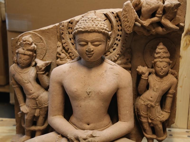 A sandstone statue of Rishabhanata, from Rajasthan or Madhya Pradesh, India, in the 10th century A.D., flanked by a pair of attendants. It is valued at approximately $150,000. A sandstone statue of Rishabhanata, from Rajasthan or Madhya Pradesh, India, in the 10th century A.D., flanked by a pair of attendants. It is valued at approximately $150,000.