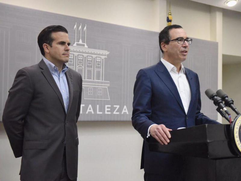 Puerto Rico Gov. Ricardo Rossello and U.S. Treasury Secretary Steven Mnuchin announced a deal that would allow billions of dollars in federal disaster recovery loans to start flowing to the hurricane-devastated island. Puerto Rico Gov. Ricardo Rossello and U.S. Treasury Secretary Steven Mnuchin announced a deal that would allow billions of dollars in federal disaster recovery loans to start flowing to the hurricane-devastated island.