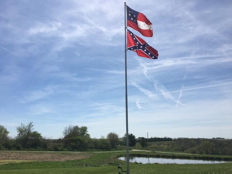 Two different variations of Confederate flags fly in Owen Golay's yard in rural Pleasantville, Iowa. Two different variations of Confederate flags fly in Owen Golay's yard in rural Pleasantville, Iowa.