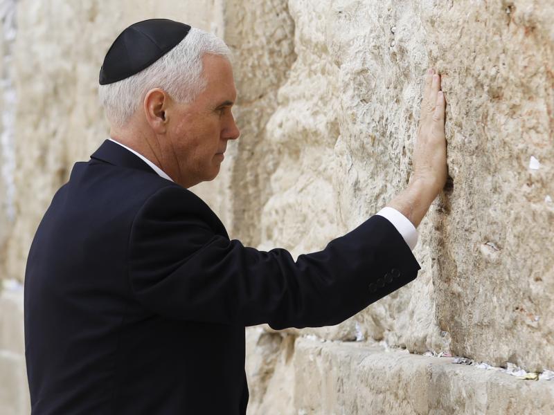 Vice President Pence touches Jerusalem's Western Wall during his visit to Judaism's holiest prayer site on Tuesday. Vice President Pence touches Jerusalem's Western Wall during his visit to Judaism's holiest prayer site on Tuesday.